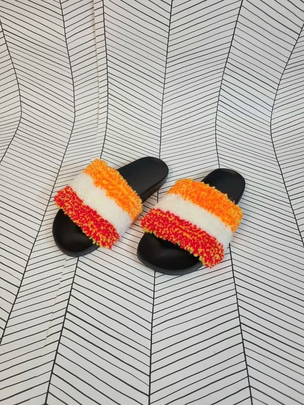 Getufte slippers met uniek design